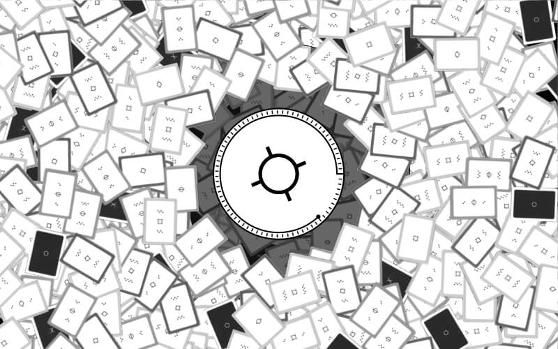 An Earth symbol surrounded by cards